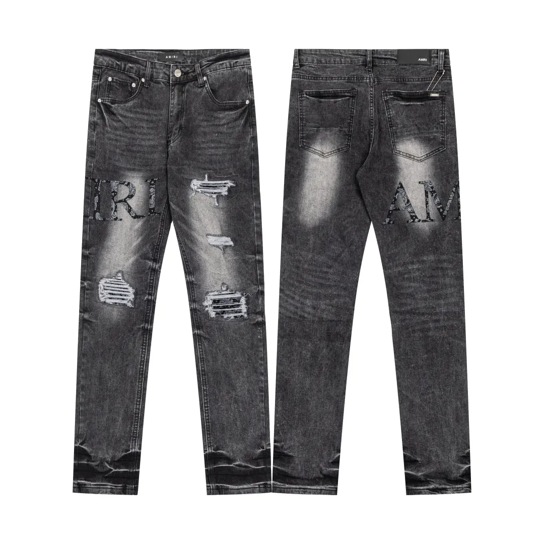 (Top version) AMIRI's new high-luxury heavy-duty stretch water patch embroidered high-street trendy men's and women's couple jeans AMIRI's family uses organic long-staple cotton denim fabrics originating in Los Angeles this year! After a pure natural alkaline phosphatase washing process, the special blue Gray tone is noble and high-end. It feels skin-friendly and delicate, and the inner layer is particularly comfortable when touching the skin! The elastic spandex component makes it particularly comfortable for daily activities. The original and rare Premium fabric is a rare find! Details after details! Amiri's New Arrival high street luxury jeans in Los Angeles mall! The front and back pieces have undergone a multi-layered three-dimensional polishing process, giving the upper body a stylish texture! The metal laser embossed MA metal Brown Nappa leather label on the waist is very exquisite! The pockets are also inlaid with tungsten steel metal logos, and the interior has exquisite ceiling-level workmanship! Hot sale jeans in Los Angeles counters! Enjoy the quality when you wear it yourself, and the value is high as a gift! Manage any large-scale business occasions and Premium private clubs without stress! Highly recommended to buy! Style number: 2058 Color: Black Size: 28 30 32 34