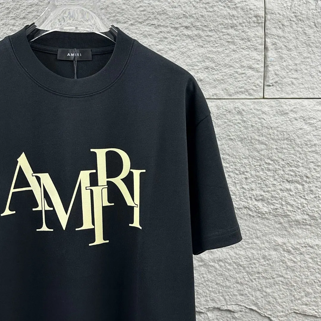 Amiri*Emile 2026 Early Spring and Summer New Arrival Customized plain cotton double yarn fabric Short-sleeved T-shirt Classic letter three-dimensional flocking technology Men and women Same Style Color: Black White Size: S (90-130 pounds) M (120-150 pounds) L (140-165 pounds) XL (160-180 pounds) XXL (180 pounds)