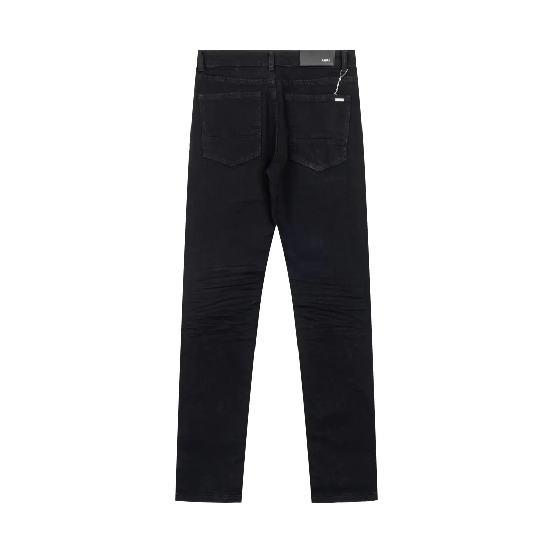 (Top version) AMIRI's new high-luxury heavy-duty stretch washed hole patch high-street fashionable men's and women's couple jeans AMIRI's family uses organic long-staple cotton denim fabrics originating in Los Angeles this year! After a pure natural alkaline phosphatase washing process, the special blue Gray tone is noble and high-end. It feels skin-friendly and delicate, and the inner layer is particularly comfortable when touching the skin! The elastic spandex component makes it particularly comfortable for daily activities. The original and rare Premium fabric is a rare find! Details after details! Amiri's New Arrival high street luxury jeans in Los Angeles mall! The front and back pieces have undergone a multi-layered three-dimensional polishing process, giving the upper body a stylish texture! The metal laser embossed MA metal Brown Nappa leather label on the waist is very exquisite! The pockets are also inlaid with tungsten steel metal logos, and the interior has exquisite ceiling-level workmanship! Hot sale jeans in Los Angeles counters! Enjoy the quality when you wear it yourself, and the value is high as a gift! Manage any large-scale business occasions and Premium private clubs without stress! Highly recommended to buy! Style number: 2044 Color: Black Size: 28 30 32 34