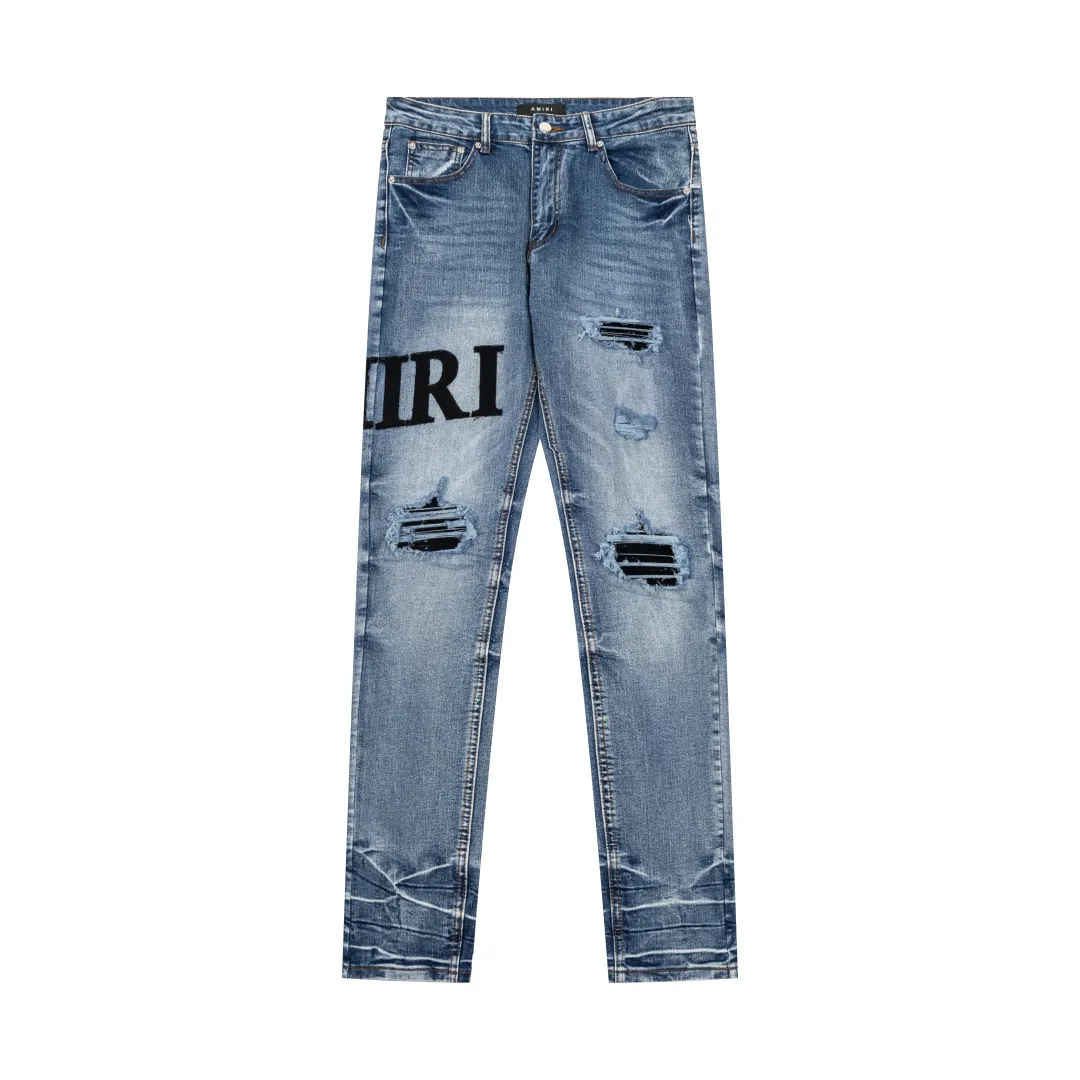 (Top version) AMIRI's new high-luxury heavy-duty stretch water patch embroidered high-street trendy men's and women's couple jeans AMIRI's family uses organic long-staple cotton denim fabrics originating in Los Angeles this year! After a pure natural alkaline phosphatase washing process, the special blue Gray tone is noble and high-end. It feels skin-friendly and delicate, and the inner layer is particularly comfortable when touching the skin! The elastic spandex component makes it particularly comfortable for daily activities. The original and rare Premium fabric is a rare find! Details after details! Amiri's New Arrival high street luxury jeans in Los Angeles mall! The front and back pieces have undergone a multi-layered three-dimensional polishing process, giving the upper body a stylish texture! The metal laser embossed MA metal Brown Nappa leather label on the waist is very exquisite! The pockets are also inlaid with tungsten steel metal logos, and the interior has exquisite ceiling-level workmanship! Hot sale jeans in Los Angeles counters! Enjoy the quality when you wear it yourself, and the value is high as a gift! Manage any large-scale business occasions and Premium private clubs without stress! Highly recommended to buy! Style number: 2056 Color: Blue Size: 28 30 32 34