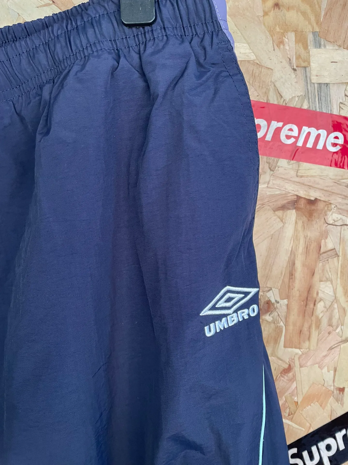 ￼ p150 Style number: 7103 Supreme SS 22 x Umbro co-branded Track Jacket hooded trendy suit casual sports trousers size: S M L XL color: Navy Blue trousers