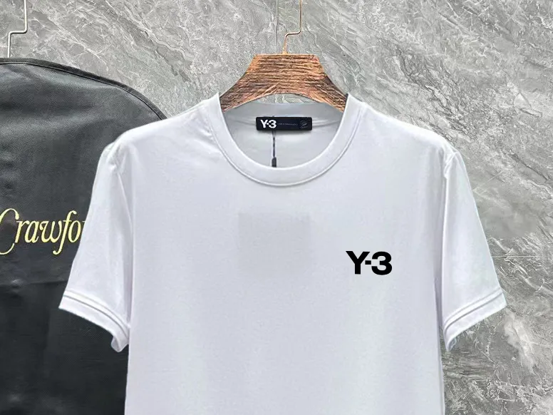 Y-3 (Y 3) #26 spring and summer top counter synchronous short-sleeved T-shirt (complete with 3 labels). It is made of 100% double mercerized fabric imported from customers. It is the original fabric of the counter. It has strong brand recognition and is full of high street and exquisite style. It will definitely become the best choice for high street appearances. Short-sleeved T-shirt for couples. The fabric is thick, has a strong say in texture and comfort, has a delicate feel, is comfortable to wear, and has a good upper body effect. The mercerized cotton fabric has a very soft hand feel and the upper body is cool. This is the first time I have gotten such functional fabric in a long time. It is really good! It’s not a cheap style or material, you will definitely like it if you are trendy! Made with the fusion of top elements, the upper body comfort is unparalleled. It can be said that it is a must-have in summer, and it is more fashionable and can easily create a fashionable super item. It interprets your luxury and taste and creates your fashionable style and charm. Fashionable round neck chest T-shirt This T-shirt has exquisite craftsmanship and full design sense! The matching is trendy and stylish! The must-have item has an elegant upper body, looks good both inside and outside, and combines fashion and comfort. It looks like a basic couple's T-shirt, but it is not. It can be worn alone. There is no problem in wearing it for all seasons. The product is really, really good! It comes from the original factory. There are not many pieces that you can count on your fingers. Whether you can own it depends on your hand speed. It is flat and snug and not easy to deform. The brand logo remains the same, creating an alternative luxury fashion atmosphere and becoming a new concept in 2026. Available in two colors: White Black Sizes: M L XL 2XL 3XL