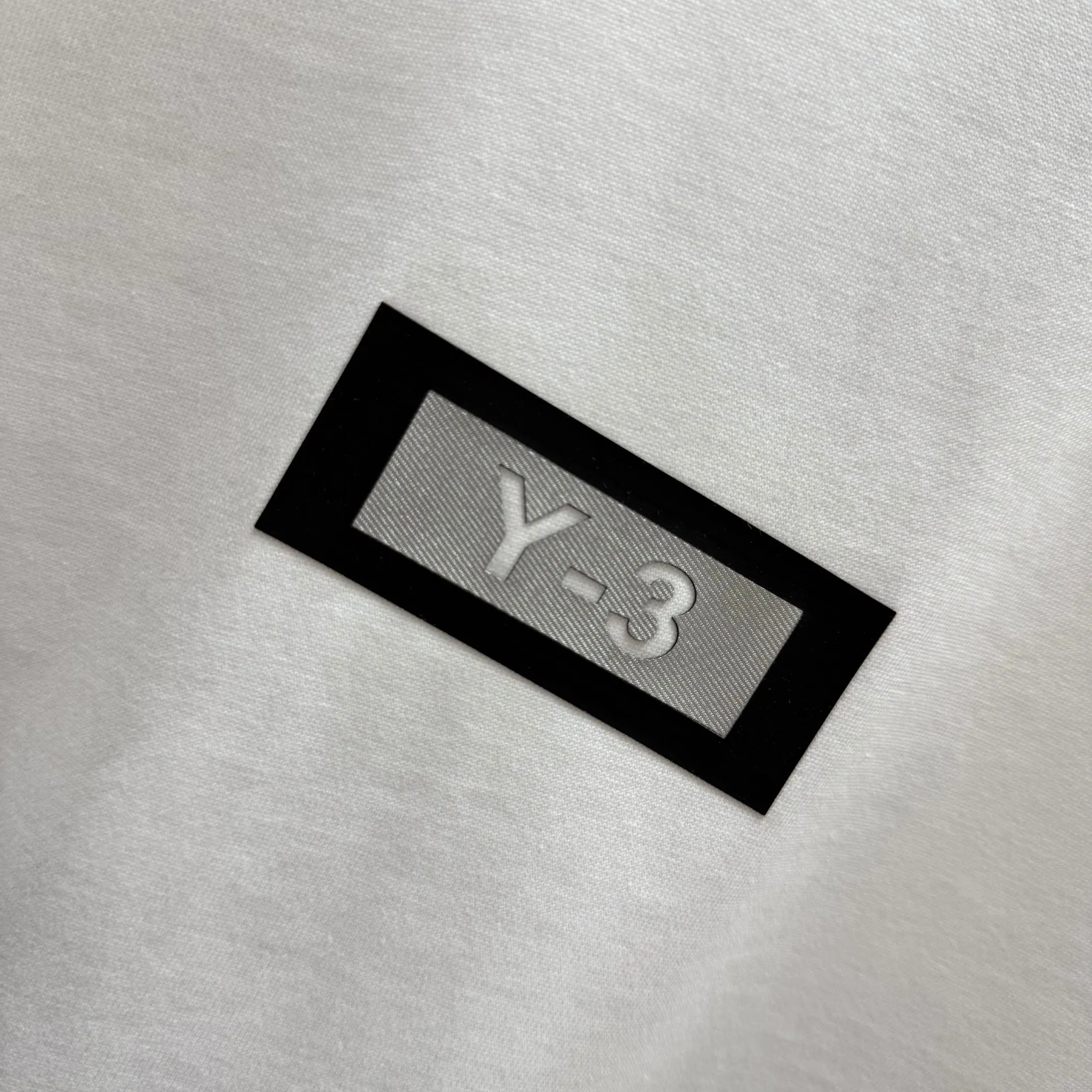 # 90 Y 3*Yamamoto*Yoji 2025 Spring and Summer New Arrival Simple signature letter thick plate silicone three-dimensional craftsmanship Y-3 Customized double yarn plain cotton fabric Short-sleeved T-shirt Men and women Same Style Size: S (90-130 pounds) M (120-150 pounds) L (140-165 pounds) XL (160-180 pounds) XXL (180 pounds) Color: Black White