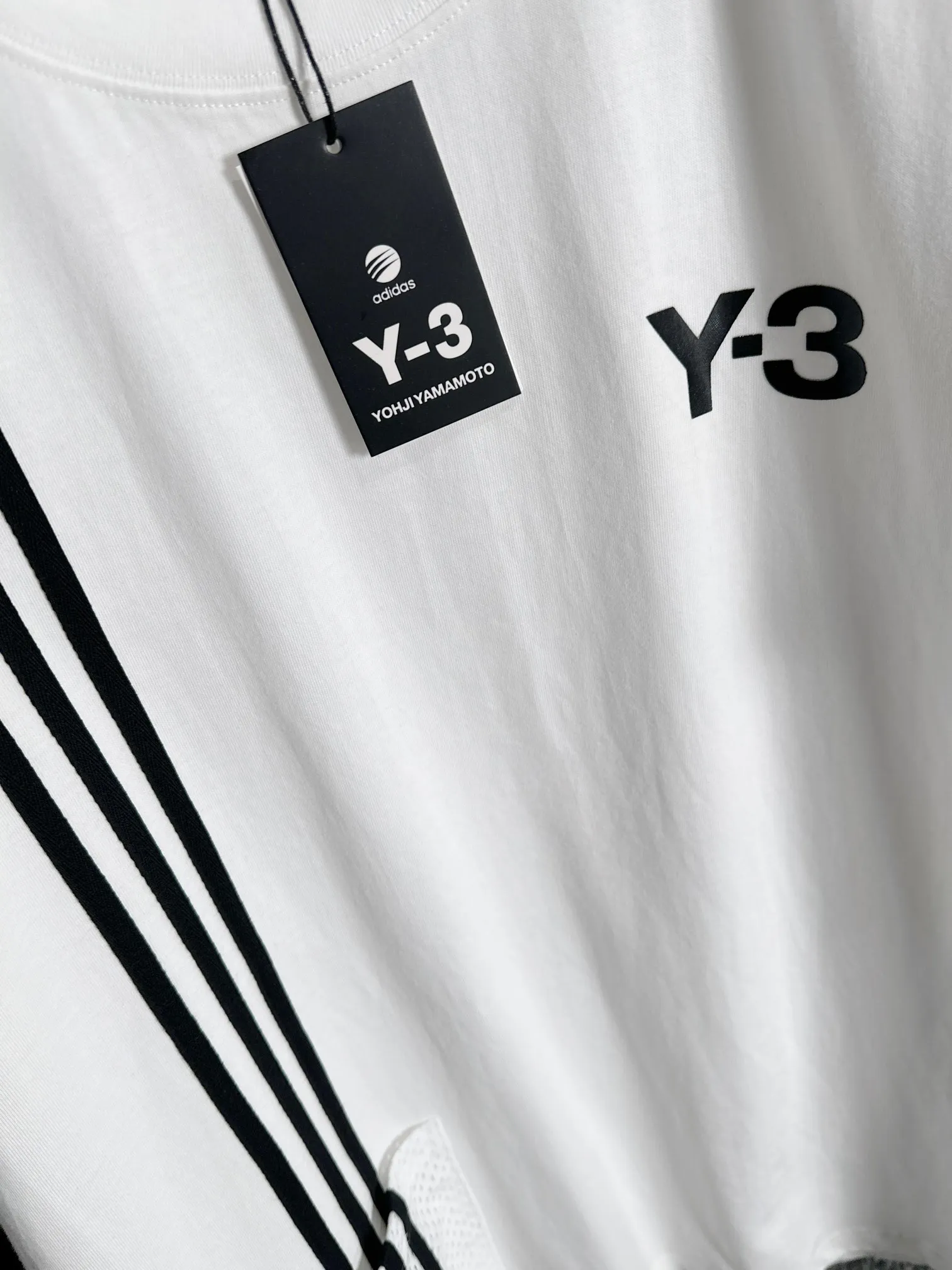 Y 3 Yohji Yamamoto × Adidas 2026New Arrival Splicing pocket Classic patch three-bar logo Men's and women's Same Style short-sleeved T-shirt Customized gram 100% double yarn pure cotton fabric Custom dyed 32 double-strand thread Collar label hangtag main mark three labels complete Color: White Size: S M L XL